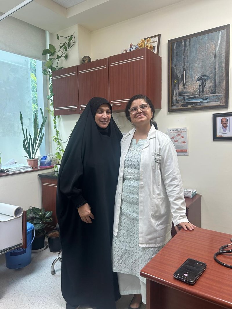 Dr. Seema Dhir with a patient at her Gurgaon clinic